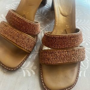 Stuart Weitzman summer sandals with stack heels.